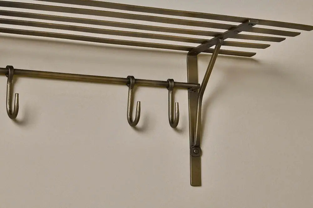 Nkuku Basti – iron storage shelf with hooks antique brass - Storage & Organisation