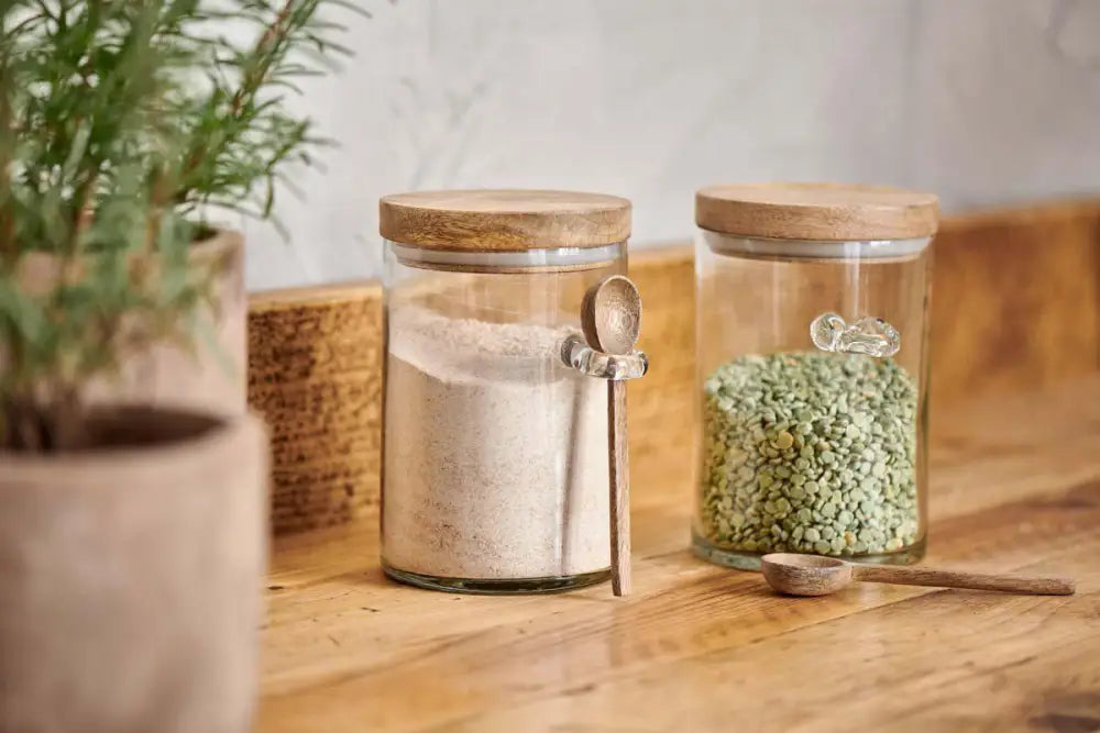 Nkuku Kossi Storage Jar – small recycled glass jar with mango wood lid - Kitchen & Dining